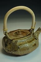 Wood-fired teapot with sculptured surface