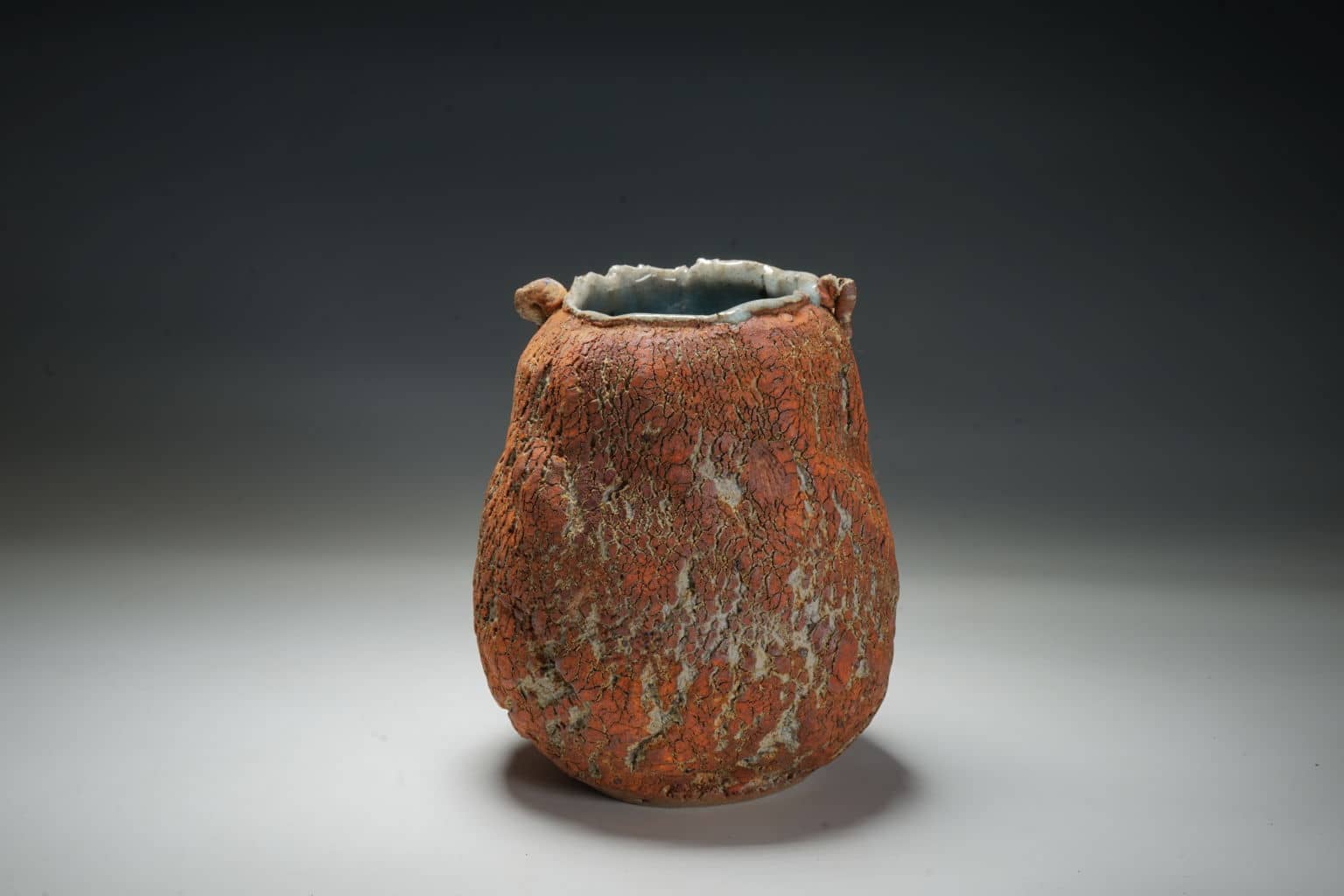 Small Abstract vase with shell imprint .