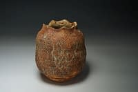 Earth texture cut sided vase