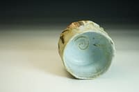 Tea bowl wiht sculptured surface, Shino, dolomite, natural ash.