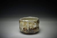 Wood-fired tea bowl, thrown and cut sided, one-off piece. Natural crystallized Celedon glaze.