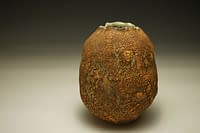 Stoneware vase with earth textured surface (1)