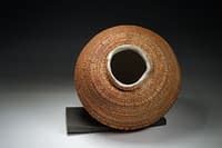 medium size bulbous vase with sculptured surface