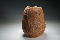 Tall cut sided earth texture vase