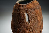 Tall cut sided earth texture vase