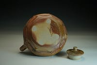 Wood-fired teapot with sculptured surface