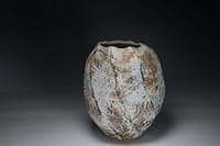 Thrown and cut sided abstract vase