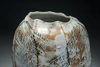 Thrown and cut sided abstract vase